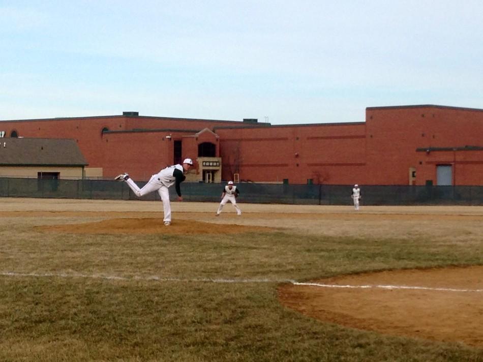 Austin Blazevik, left, pitches from the mound at the April 1 game against Morris. The Plainfield boys won 6-3.