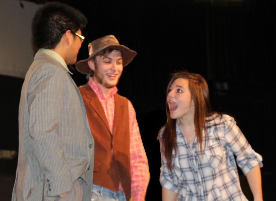 Sheldon Ticala sophomore, Tyler Kauffmen junior,  and Mary Crushing senior preform a scene in Beverly Hillibillies, opening on Nov. 13 at 7:30p.m.