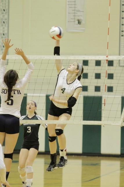 Girls volleyball reaches high