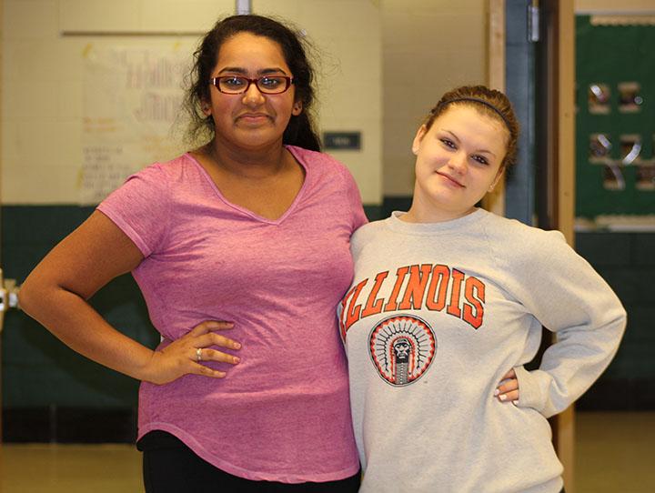 Sophomore student ambassador Riya Parikh shows transfer student, sophomore Marie Divers around the school.