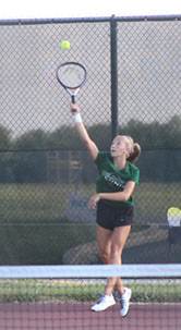 Sophomore, Katie Kearney serves to her opponent in her win vs.
Plainfield South.