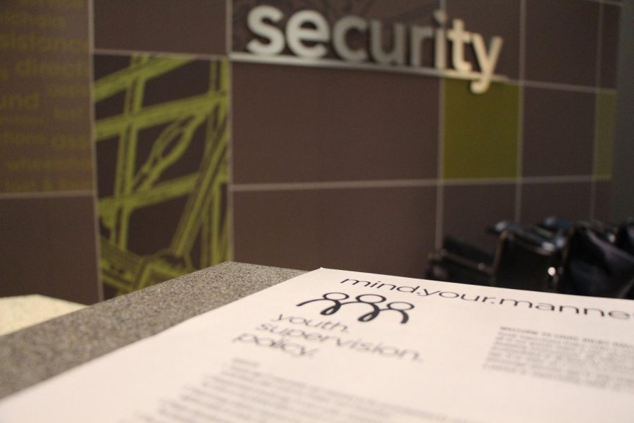 The new Youth Supervision Policy is displayed on a security desk in the Louis Joliet Mall. The policy, which prohibits minors from entering after 5p.m. without adult supervision, went into effect on Oct. 13. 