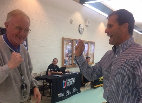 Doug O'Brien, campus monitor has "Happy Birthday" sung to him for a change by Principal Dave Stephens.