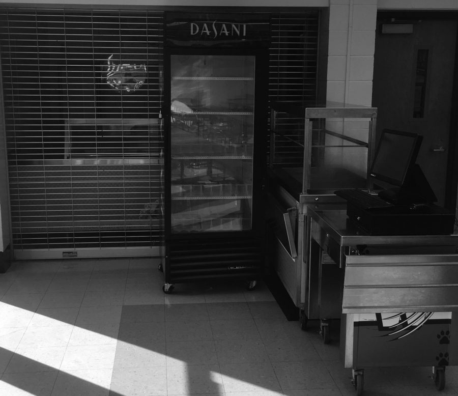 A metal gate closes off the previous deli, which doesn’t plan to reopen.