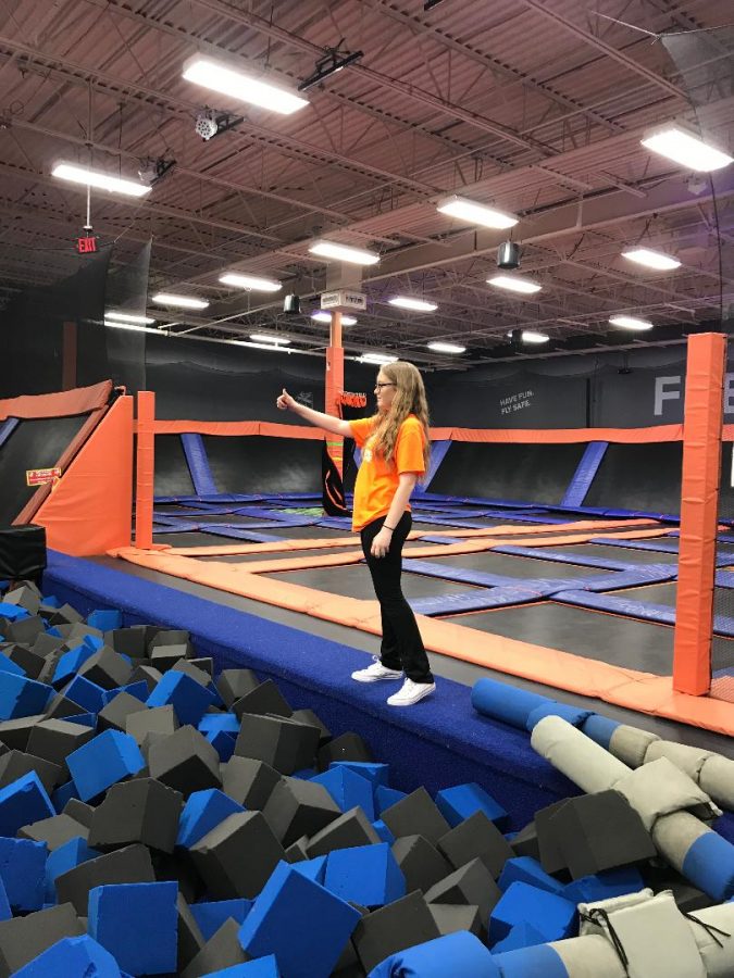 Junior Juliette Hop monitors the joust court at her job at Sky Zone in joliet.