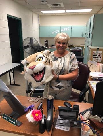 Judy Vihnanek accepts the first Wildcat Award of the 2018-19 school year.