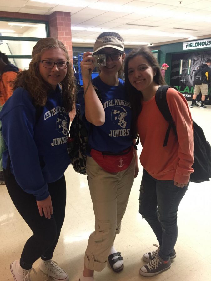 (From left to right) Danielle Williams and Kyra Kohlstedt, juniors, and Emily Flores, senior, dressed for powderpuff class color and tacky tourist