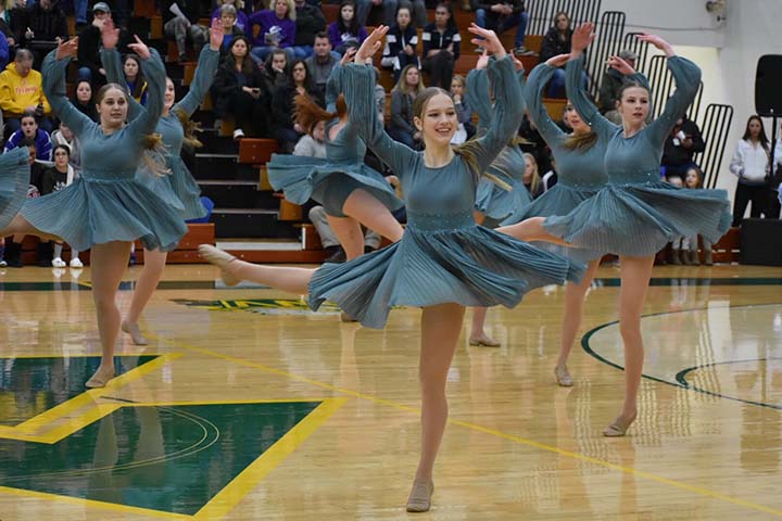 Sophomore Ella Majewski completes a la seconde turn in the teams lyrical routine.