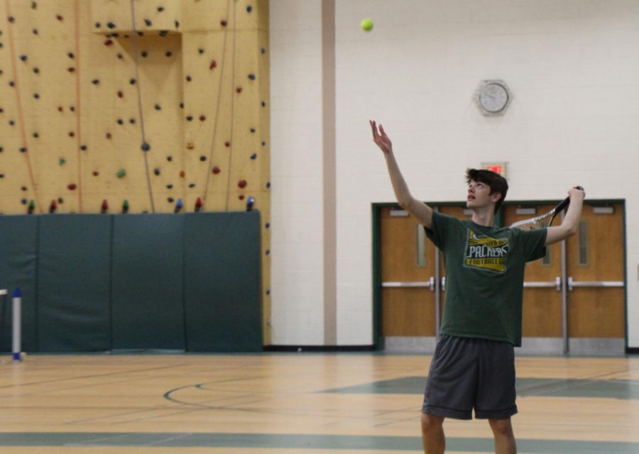 The tennis team has begun practicing indoors until the weather warms up.