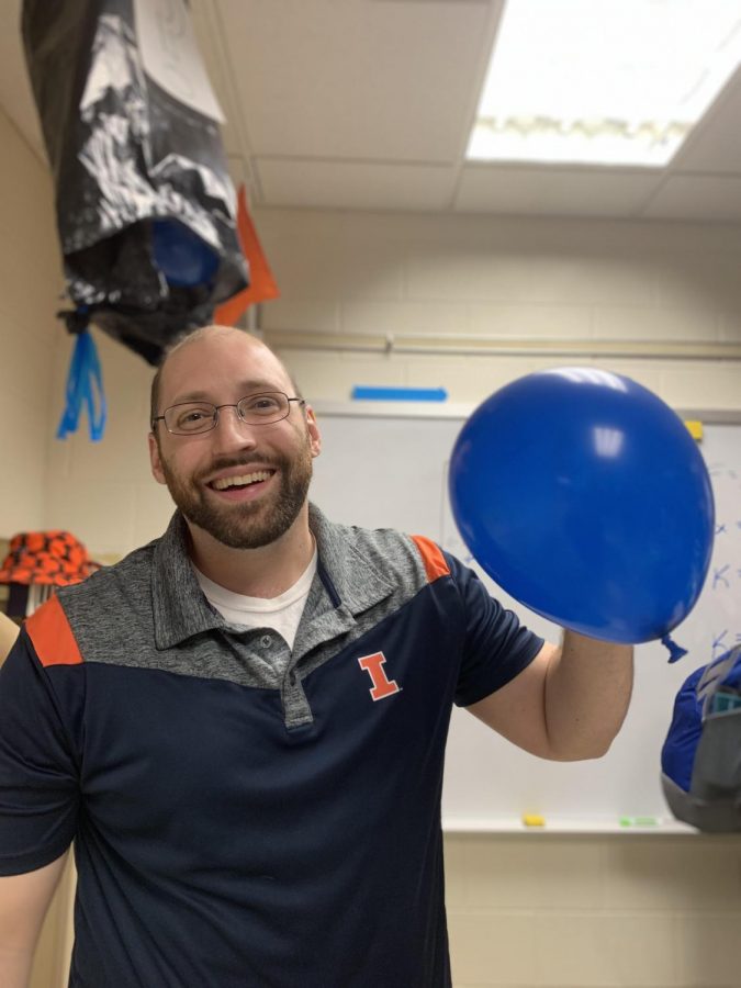 Ben+Nugent%2C+physics+teacher%2C+announced+the+gender+of+his+third+child+by+cutting+open+a+bag+of+blue+balloons.