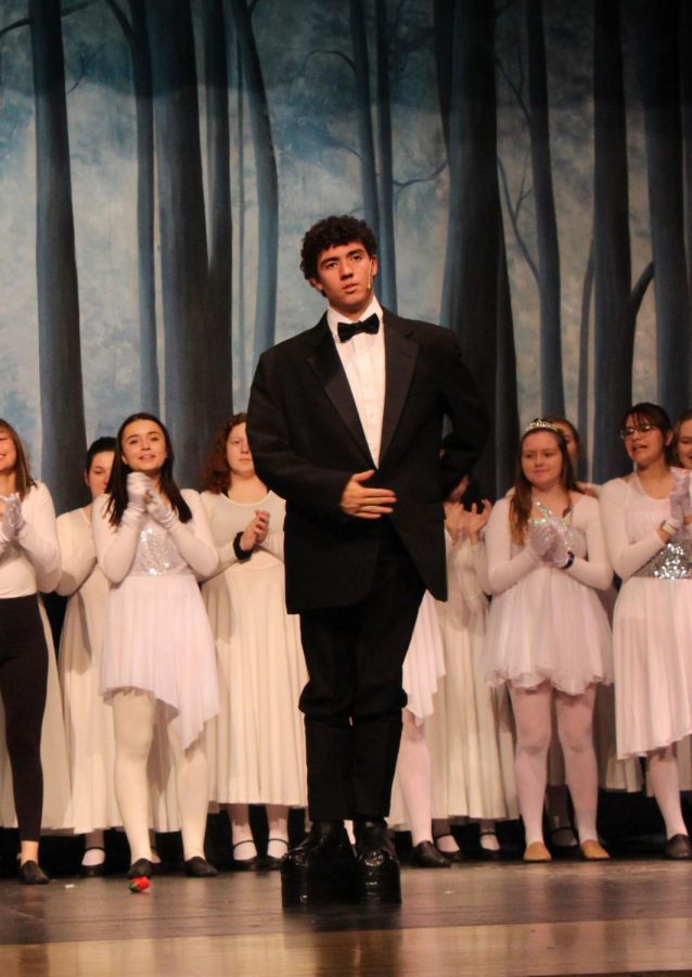 Sophomore Brayden Ruland (Lurch) moves up the stage during the finale Move Towards the Darkness.