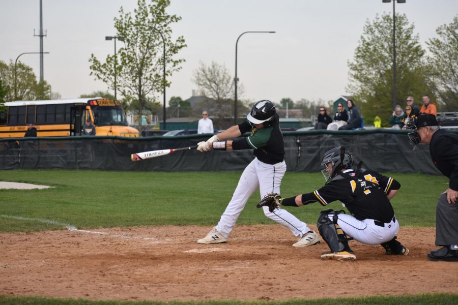 Junior Brandon Micetech connects with the pitch. He has commited to Eastern Illinois University to play baseball.