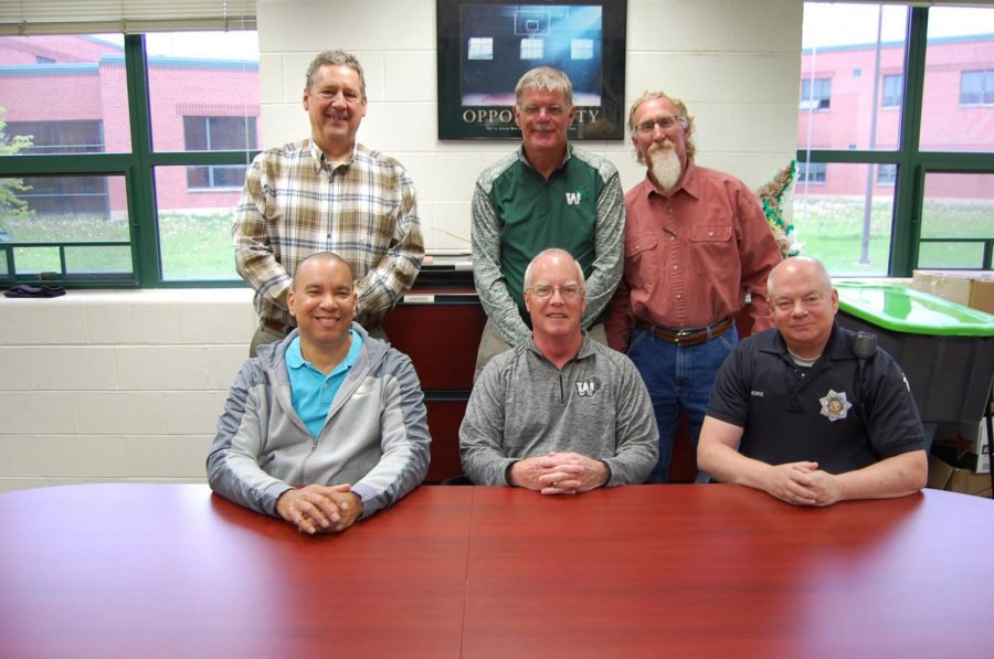 Back to front: Dave Rahtz, science teacher; John Bayer, biology teacher; Phil Coats, special ed teacher;  Mark Hudson, PE teacher; Tom Bond, math teacher; and Jason Kopek, human resource officer, retire in June.