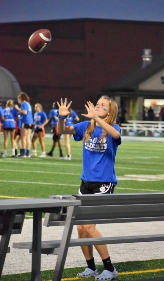 Taylor Babec, senior, practices her catching before stepping in to play for the seniors.