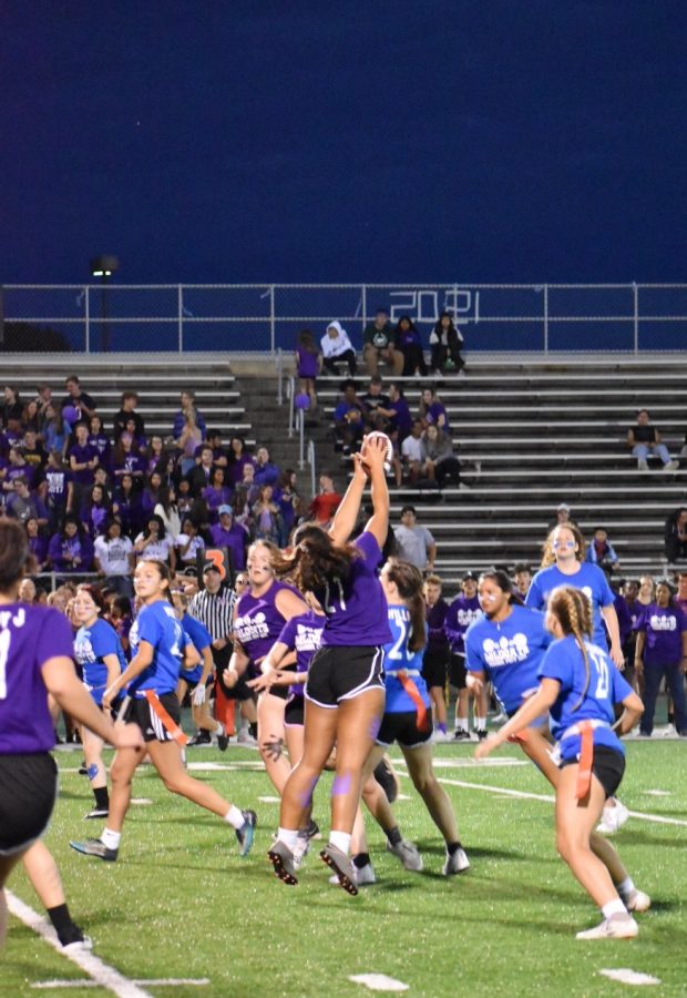 Rylee Binkley, junior, catches the ball in mid air during second quarter with the juniors still on top. 