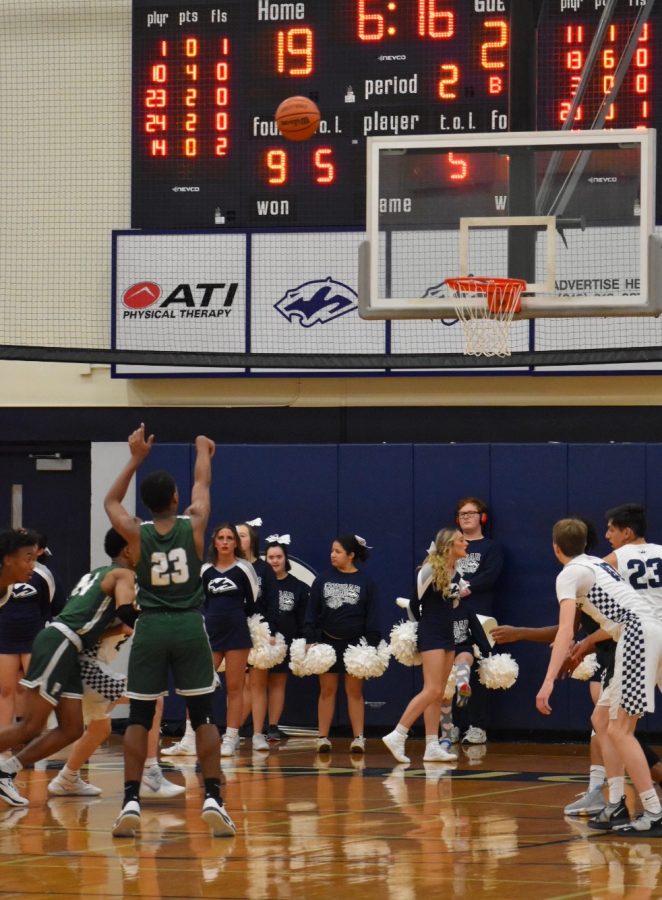 Kameron Flowers, junior, shoots at the free throw line.