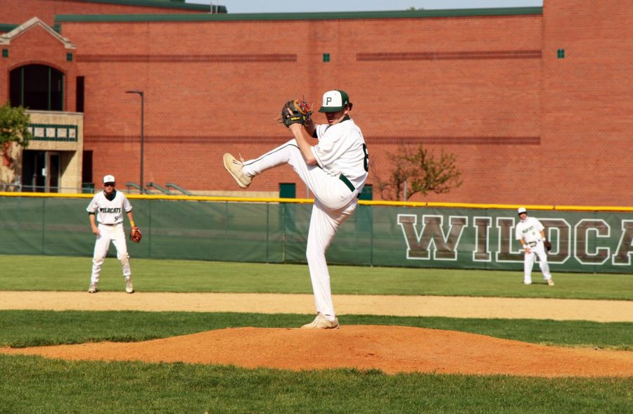 Brandon Leidolph, senior, winds up for the pitch. 