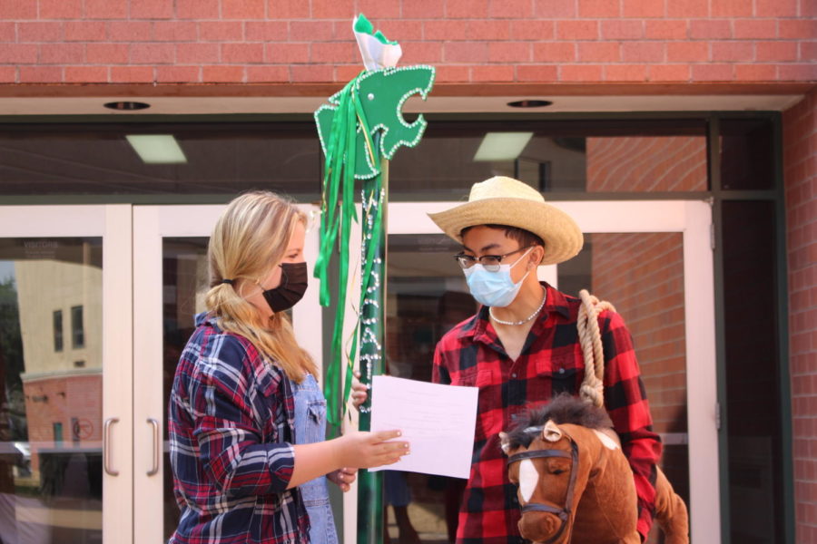 NHS Senior Officers, Taylor Rock and Isaac Gallinero prepare to award the spirit stick!