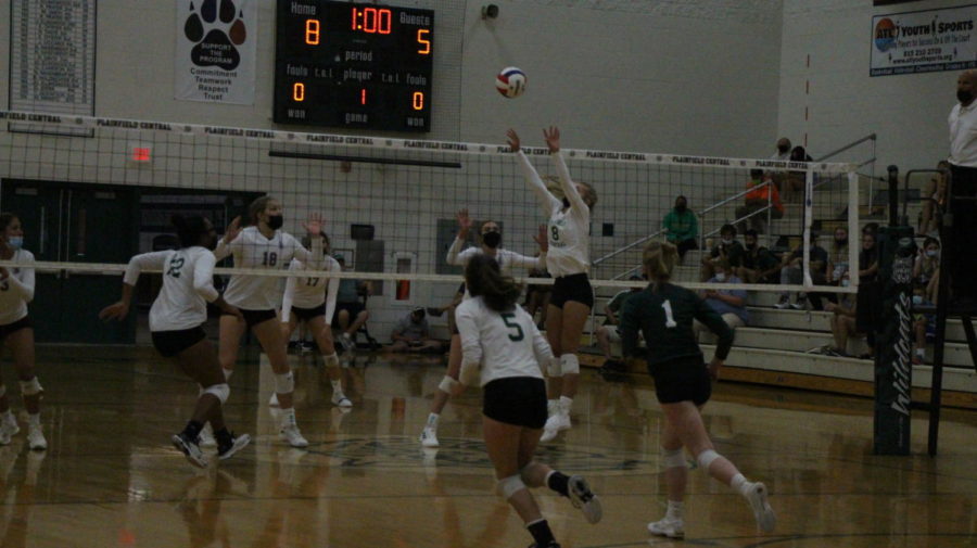 Jenny+Shook%2C+senior%2C+sets+up+a+spike+to+help+the+Wildcats+in+their+three-set+victory+over+Lockport+on+Sept.+14.+