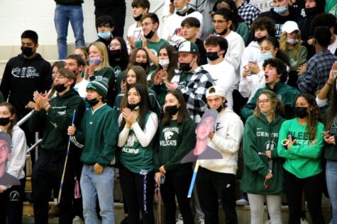 Superfans lead the student cheering section at the Green and White Night on Nov. 19.