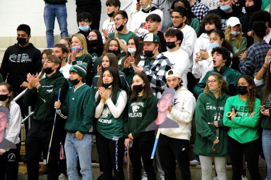 Superfans+lead+the+student+cheering+section+at+the+Green+and+White+Night+on+Nov.+19.