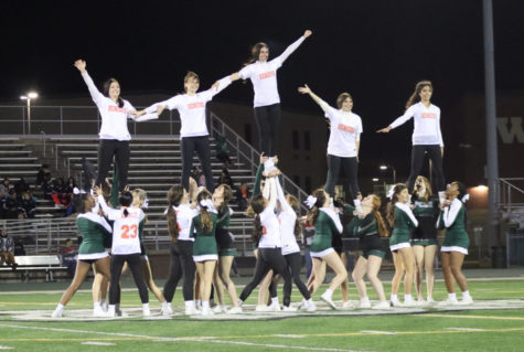 The cheer team performs at halftime at Plainfield Central’s win over Joliet Central.