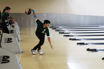 Jacob Chavez, varsity junior, attempts to pick up a spare at Plainfield Lanes against Joliet Central High.