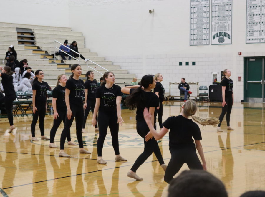 The girls wear black in keeping with the Black Out theme of the night.