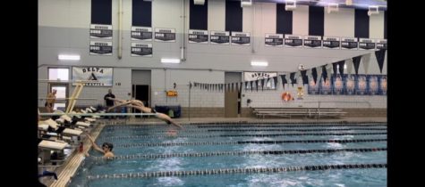 Senior Joe Broadway practices diving drills in the week before competing at IHSA State on Feb. 26.