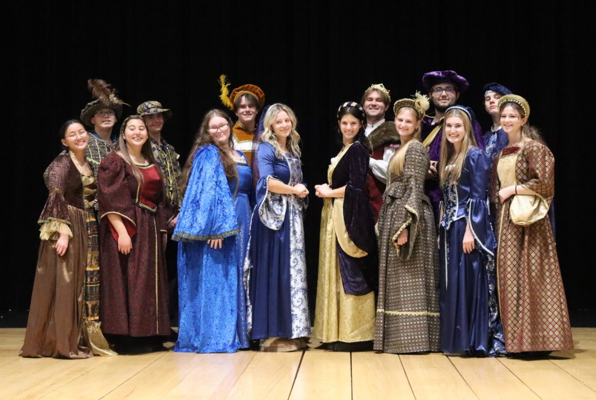 The Madrigal singers rehearse before opening night.