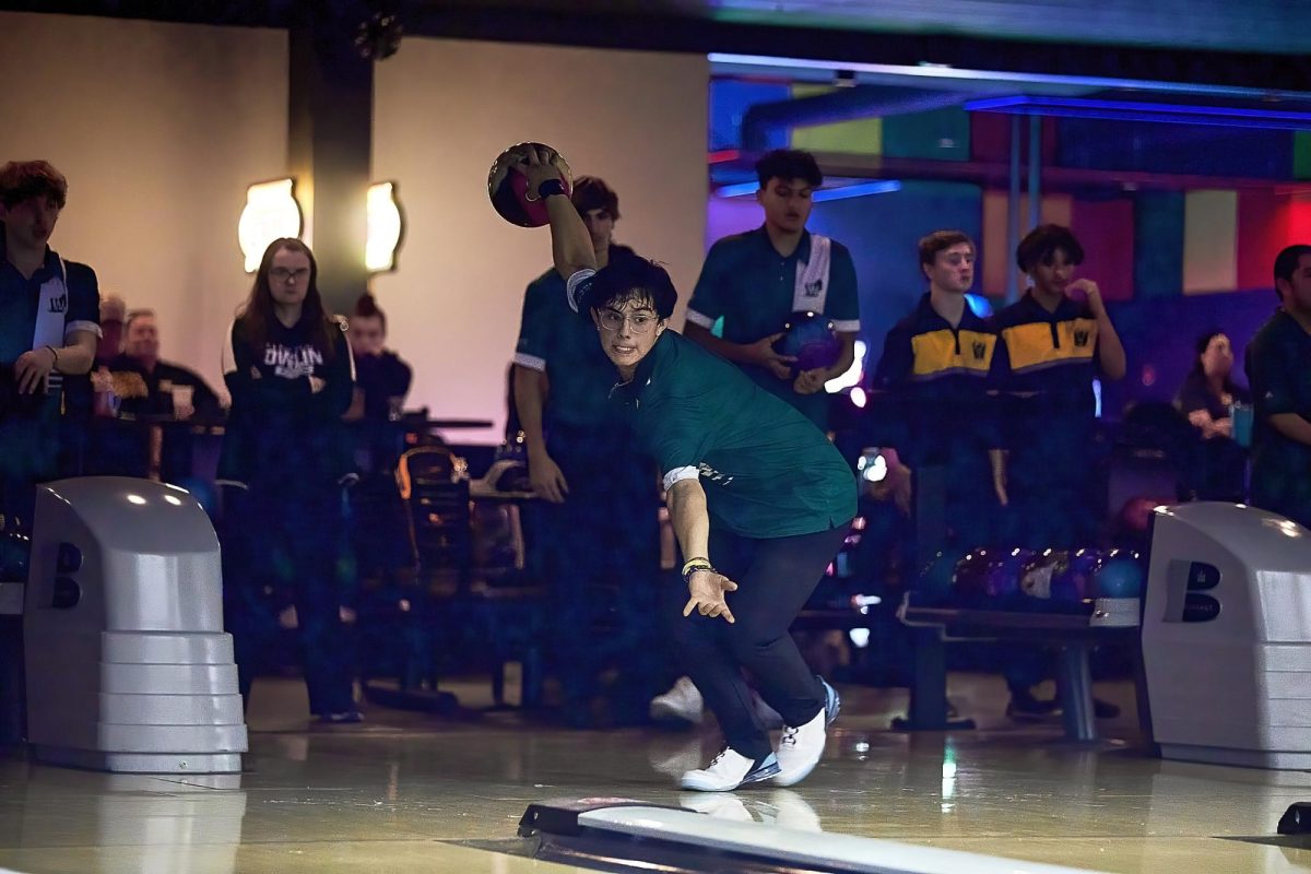 Jacob Chavez, senior, prepares to bowl during an intense game.