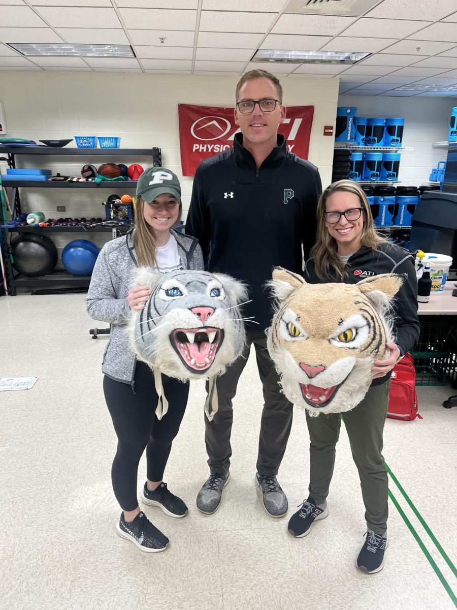 Matt Nohren, science teacher, selects Courtney Prieboy and Brandi Richard, the PHS Athletic Training Staff, as the next recipients of the Wildcat Award.