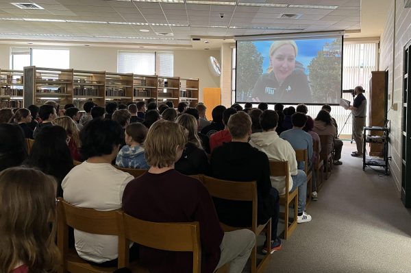 AP physics students listen to MIT professor Anne White discuss fusion on Zoom. 