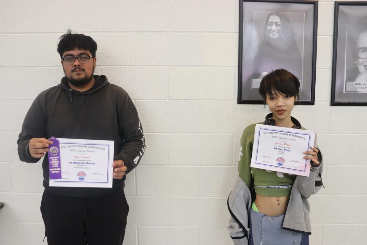 Competiton winners Alan Sanchez and Kaylyn Pryor presenting their respective awards.