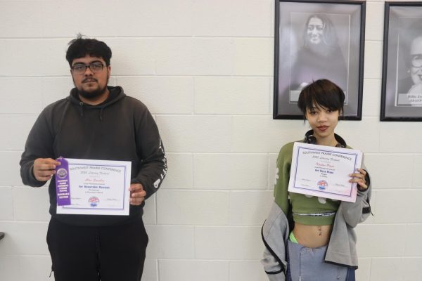 Competiton winners Alan Sanchez and Kaylyn Pryor presenting their respective awards.