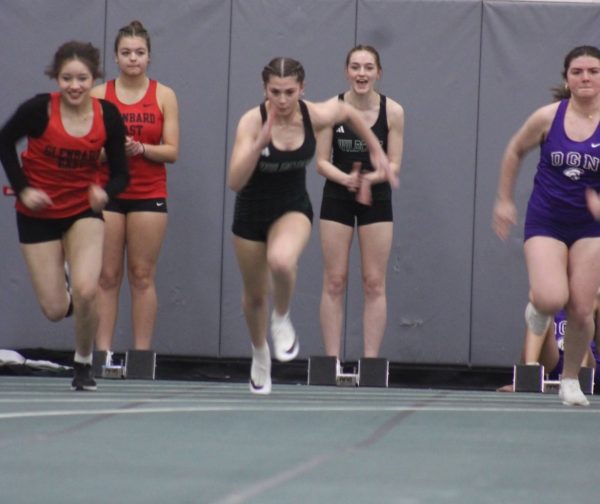 Junior Sydney Facio sprints for the win in the 55 m dash at the meet on Feb.14.